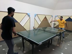Students playing table tennis